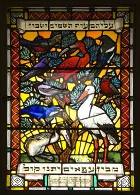 Stained glass window depicting birds
